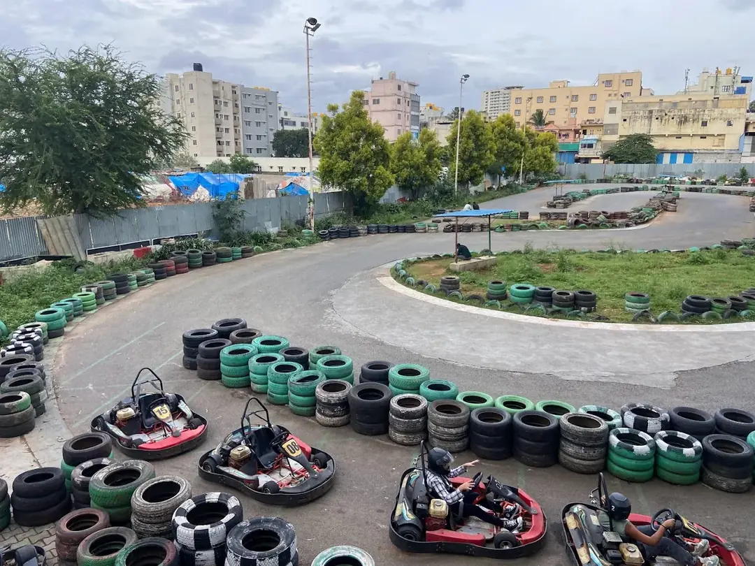 Go-karts lined up at Play Arena's outdoor track