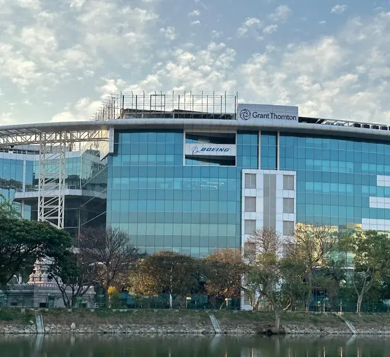 Glass office building with the Grant Thornton logo