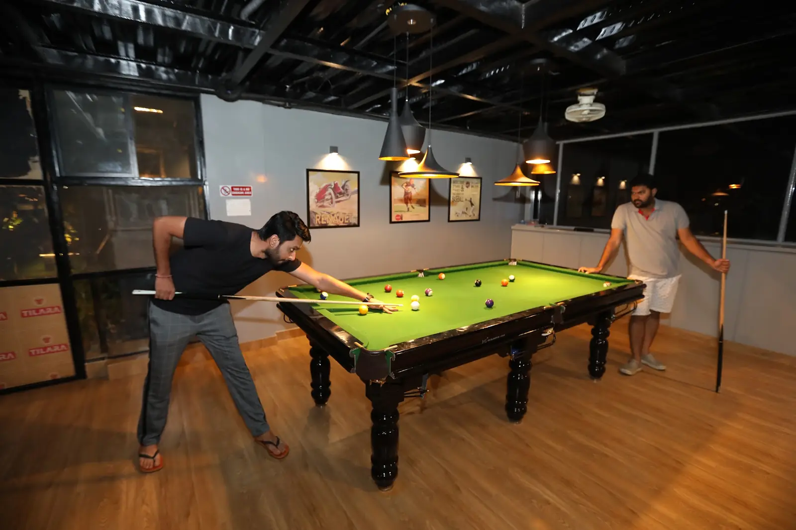 Residents playing pool