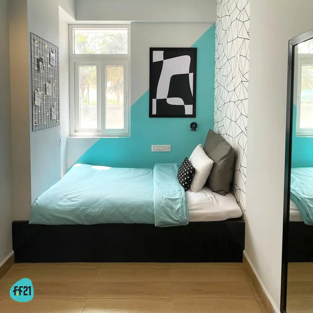 Bright room with a teal accent wall
