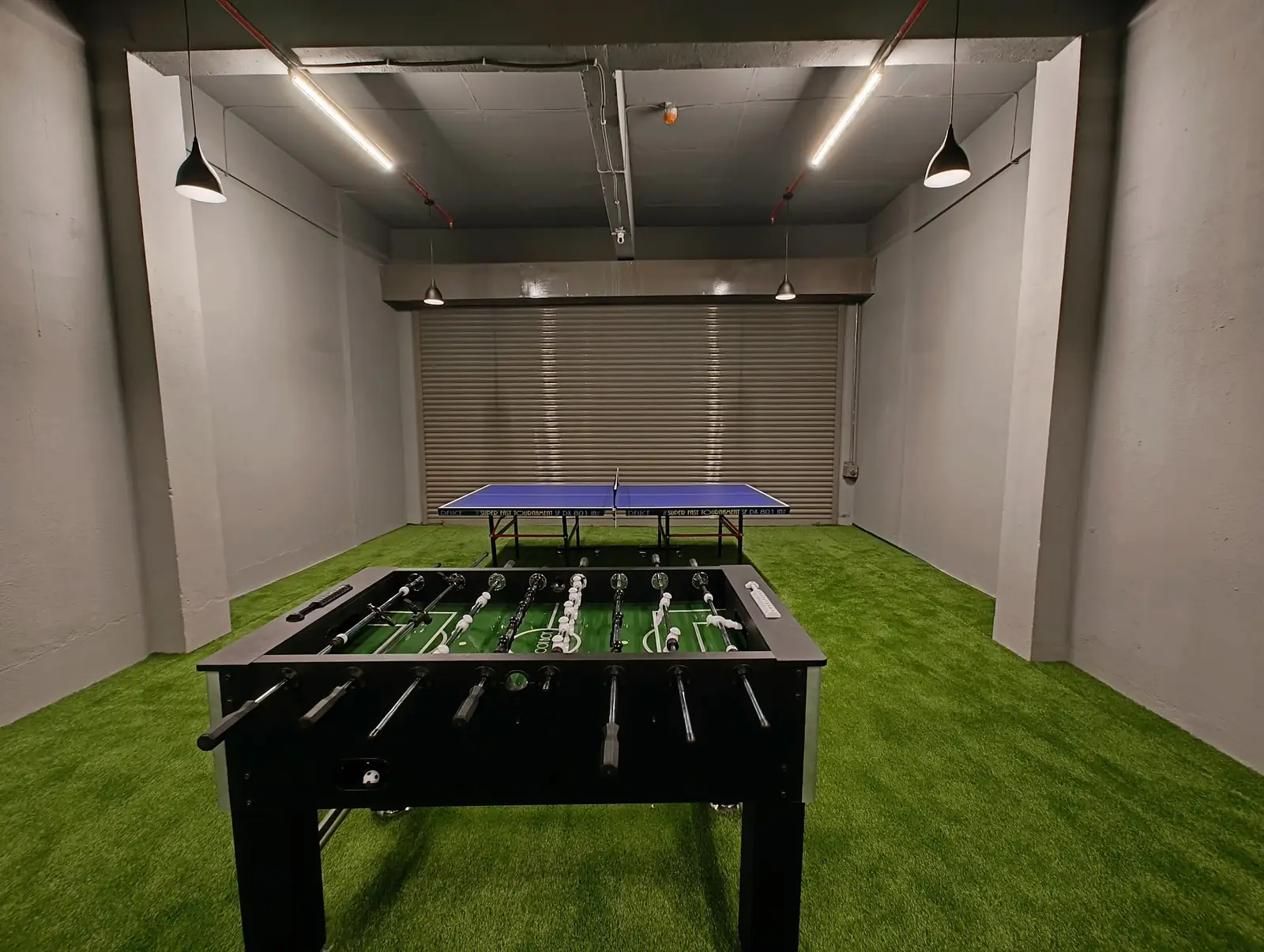 Foosball on green turf